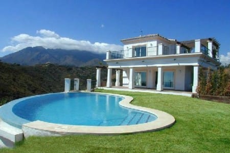 An impressive luxury hillside villa with superb sea and country views, Estepona