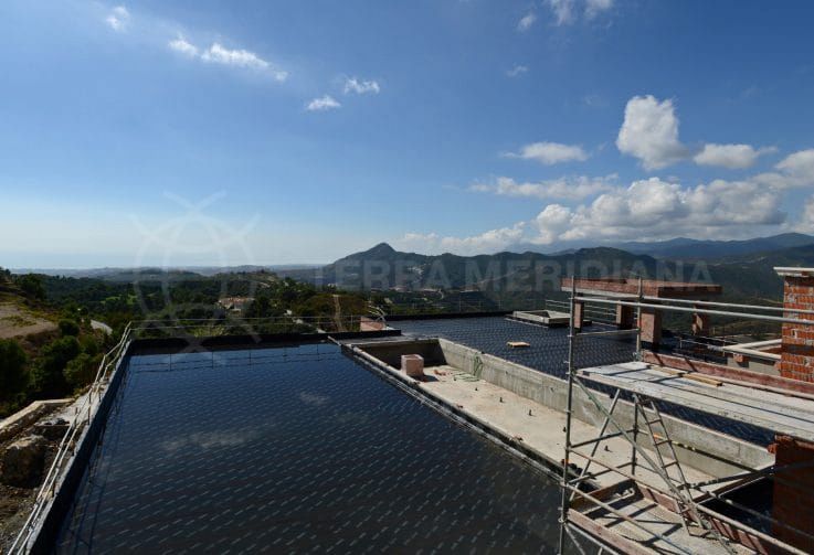 Stage 5: Plastering the façade and waterproofing the terrace