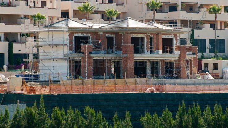 Stage 8: Plastering the façade and building garden walls