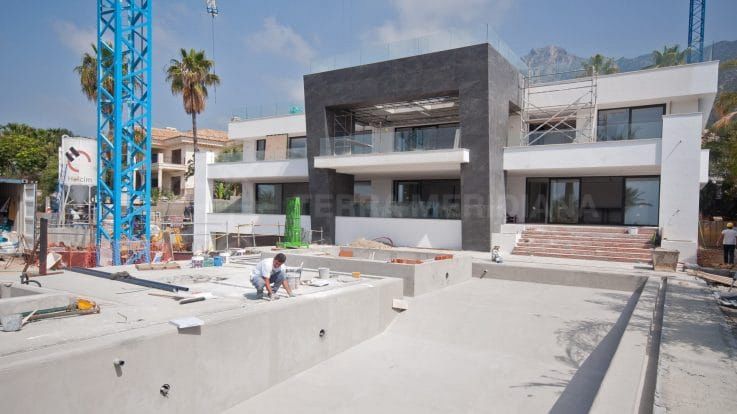 Stage 11: Scaffolding comes down, staircases go up (and down)